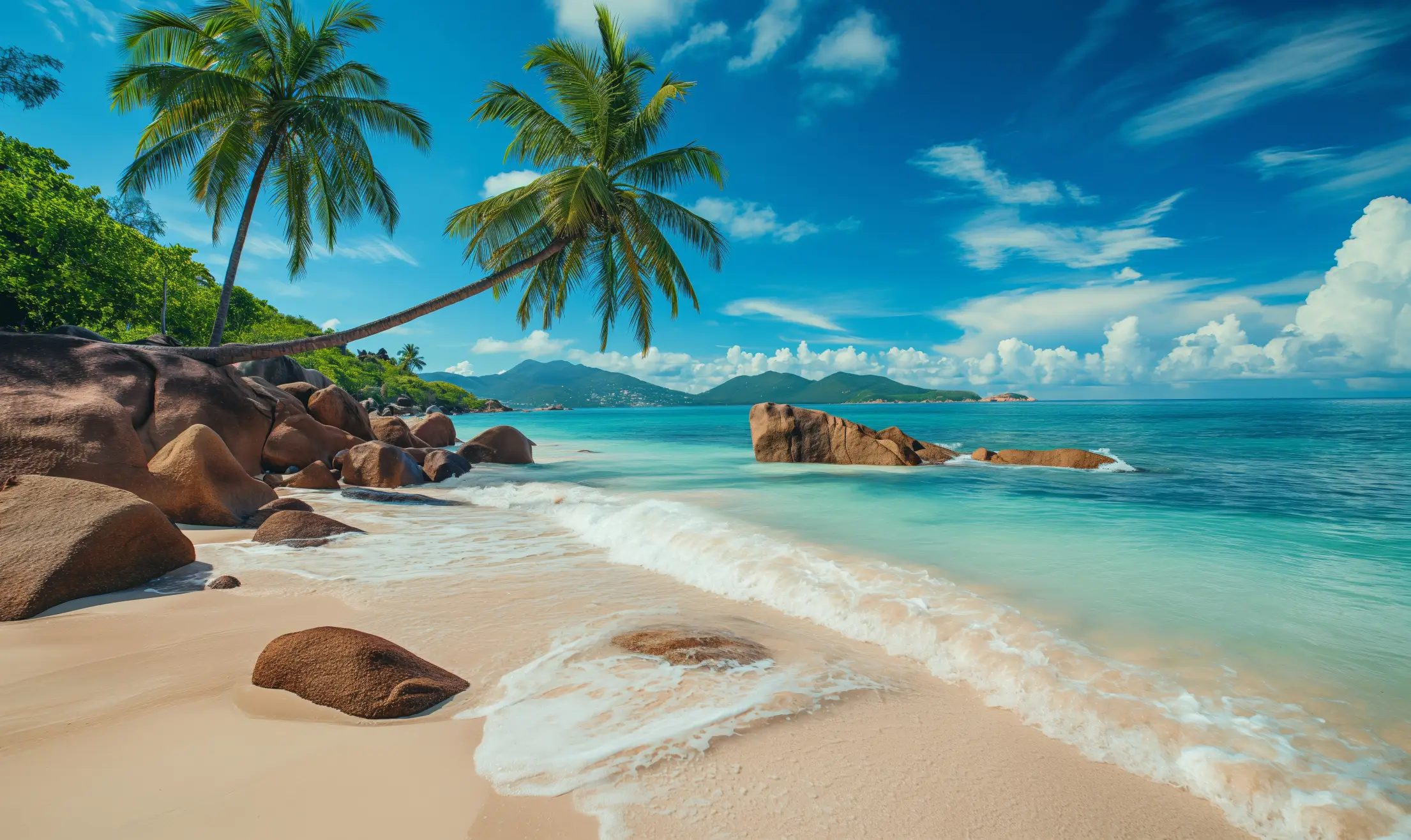 Granite mountain and beach with the Seychelles flag